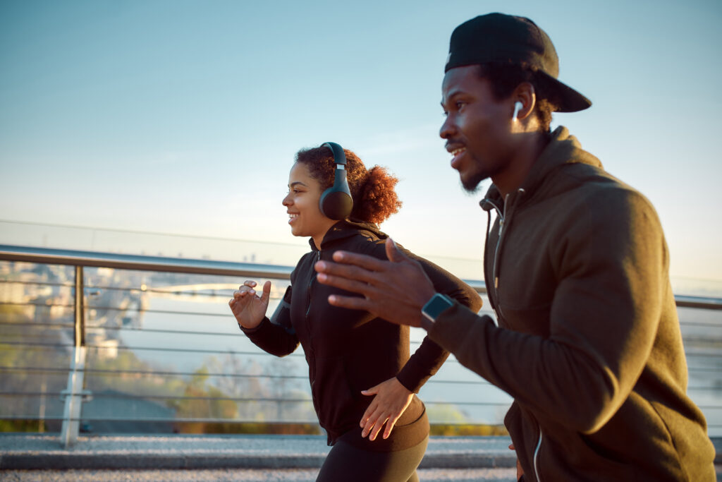 African American Couple Running